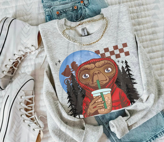 ET drinking iced coffee