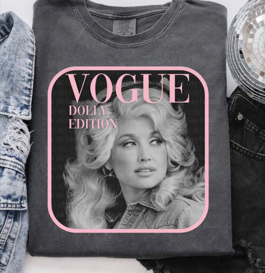 Gray sweatshirt with a graphic of Dolly on a magazine cover design, labeled 'Vogue Dolly Edition'.